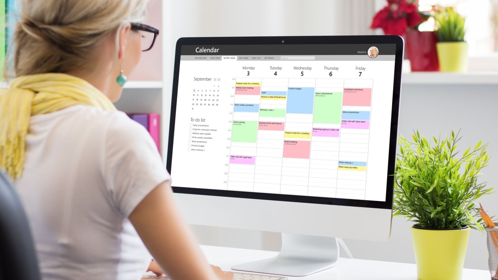 A woman uses time blocking to manage her work calendar.