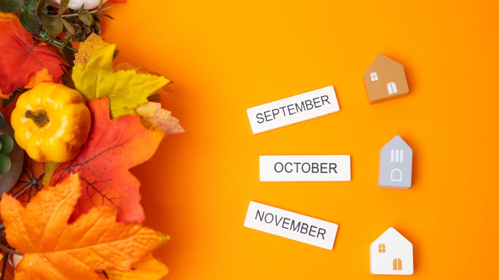 Autumn colored image with gourds and colorful leaves listing three of the fall months September, October, and November.