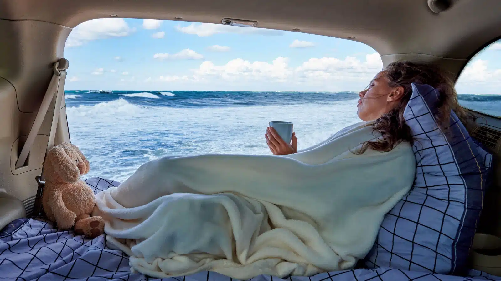 A woman filled the back of her SUV with blankets and cushions to make sleeping in the car more comfortable.