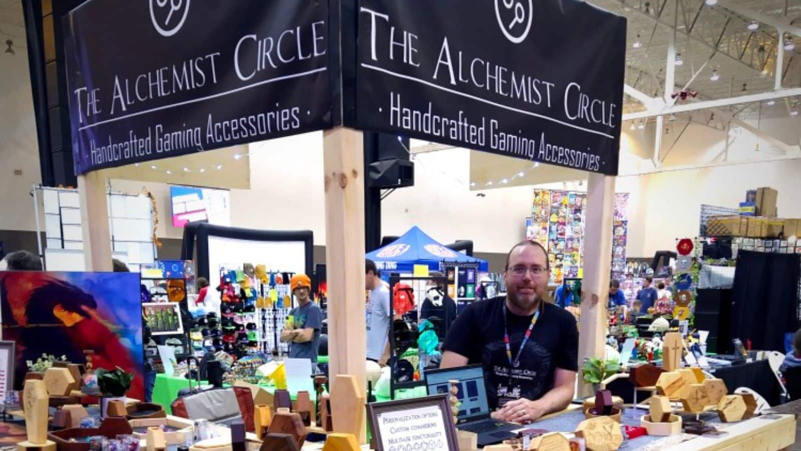 Cody Terry working The Alchemist Circle's convention booth.