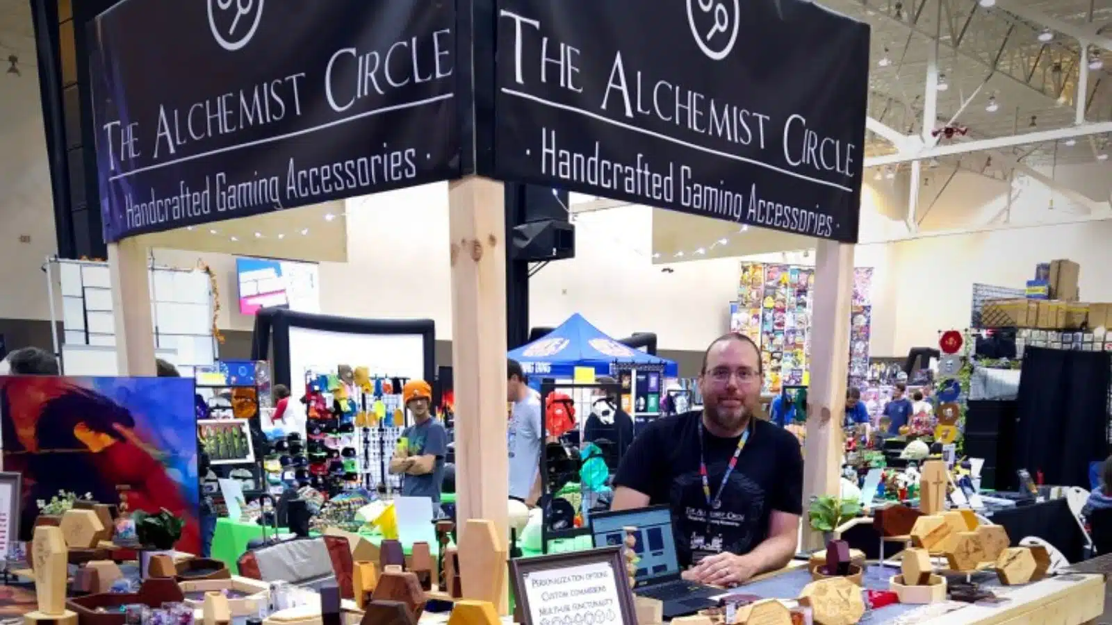 Cody Terry working The Alchemist Circle's convention booth.