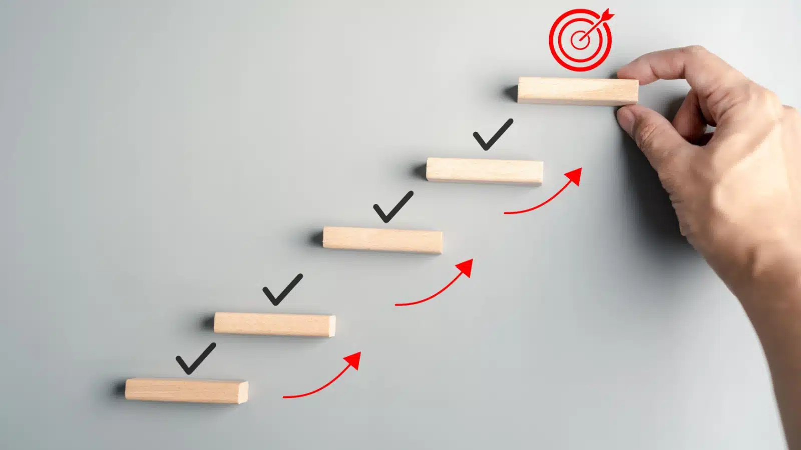 Concept art of taking small steps to reach your goals.