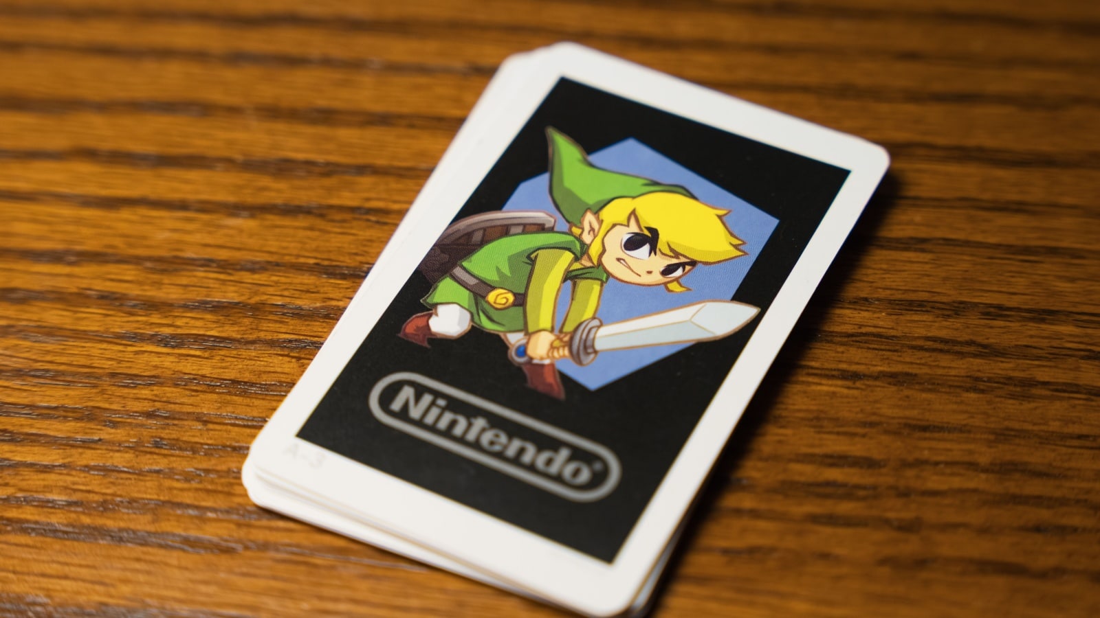 A card featuring the Hero of Legend, Link from The Legend of Zelda series, as he appears in a Nintendo 3DS game, to represent the best The Legend of Zelda games.