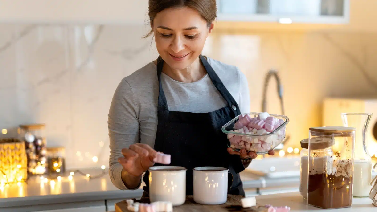 A woman prepares the wintery favorite, hot chocolate.
