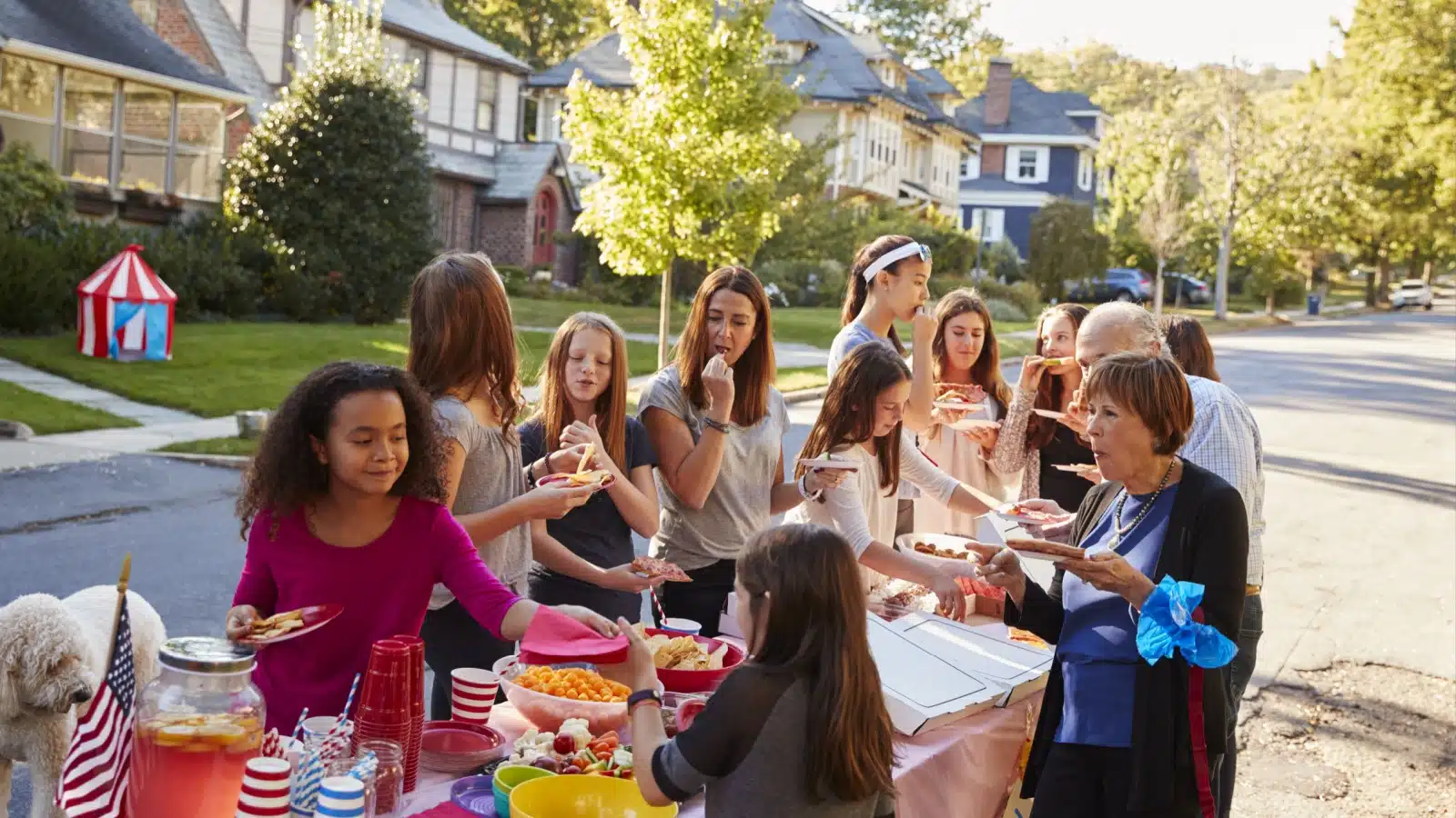 Neighbors enjoying a block party.