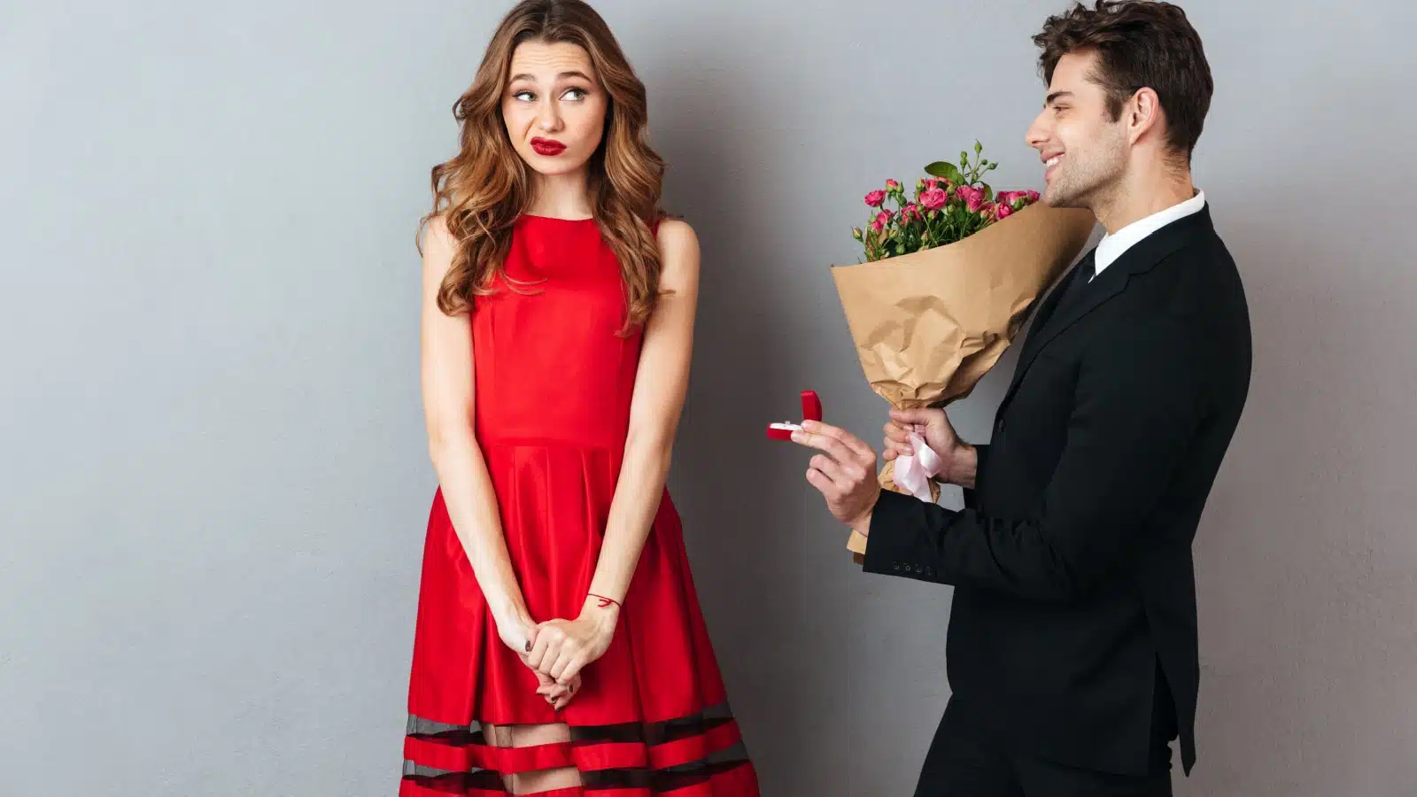 An attractive woman refuses a proposal from an attractive men, to represent the idea that women's standards are too high.