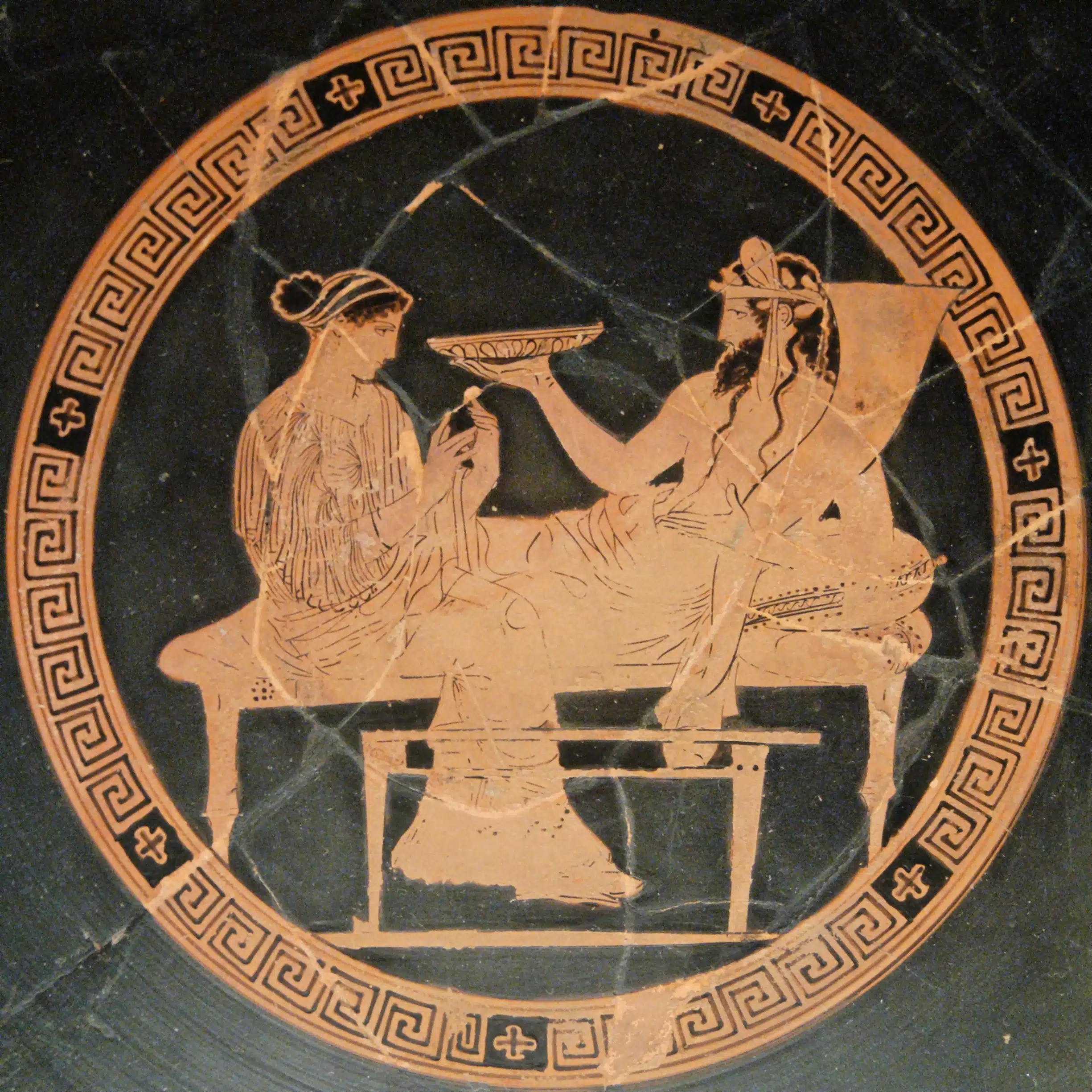 A vase depicting Hades & Persephone lounging together in the Underworld.